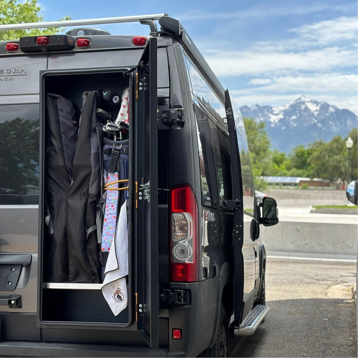 Avatar Offroad Caddie Golf Storage Box mounted on vehicle door, open with golf bag inside