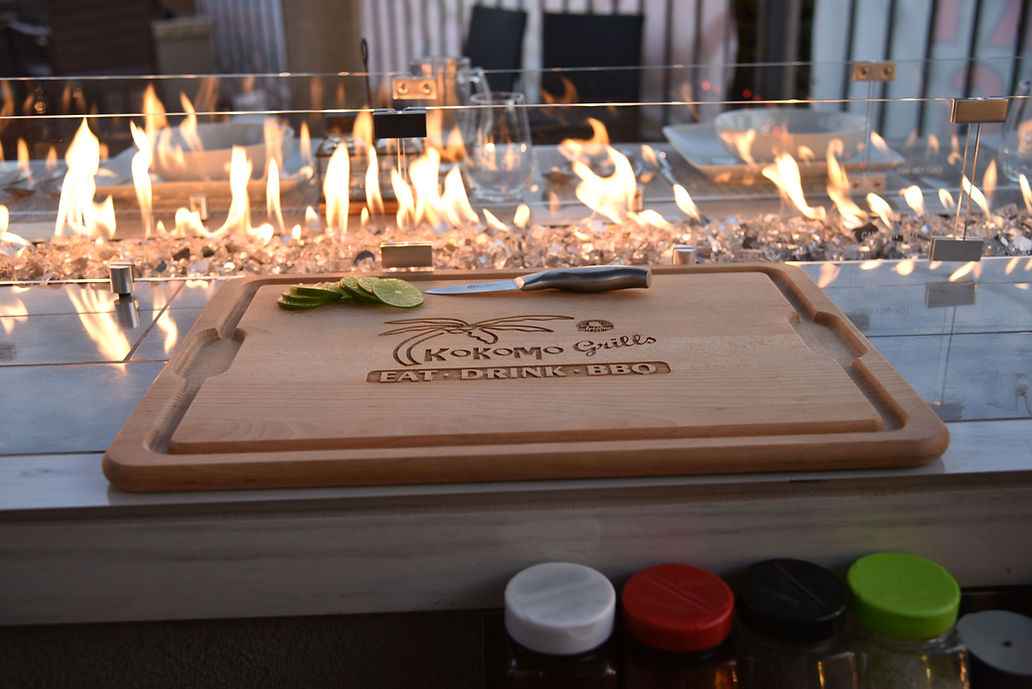KoKoMo Bermuda Kitchen BBQ Island with Built-In TV, Fire Pit & Bar for Ultimate Outdoor Entertaining - Home Outpost Supply
