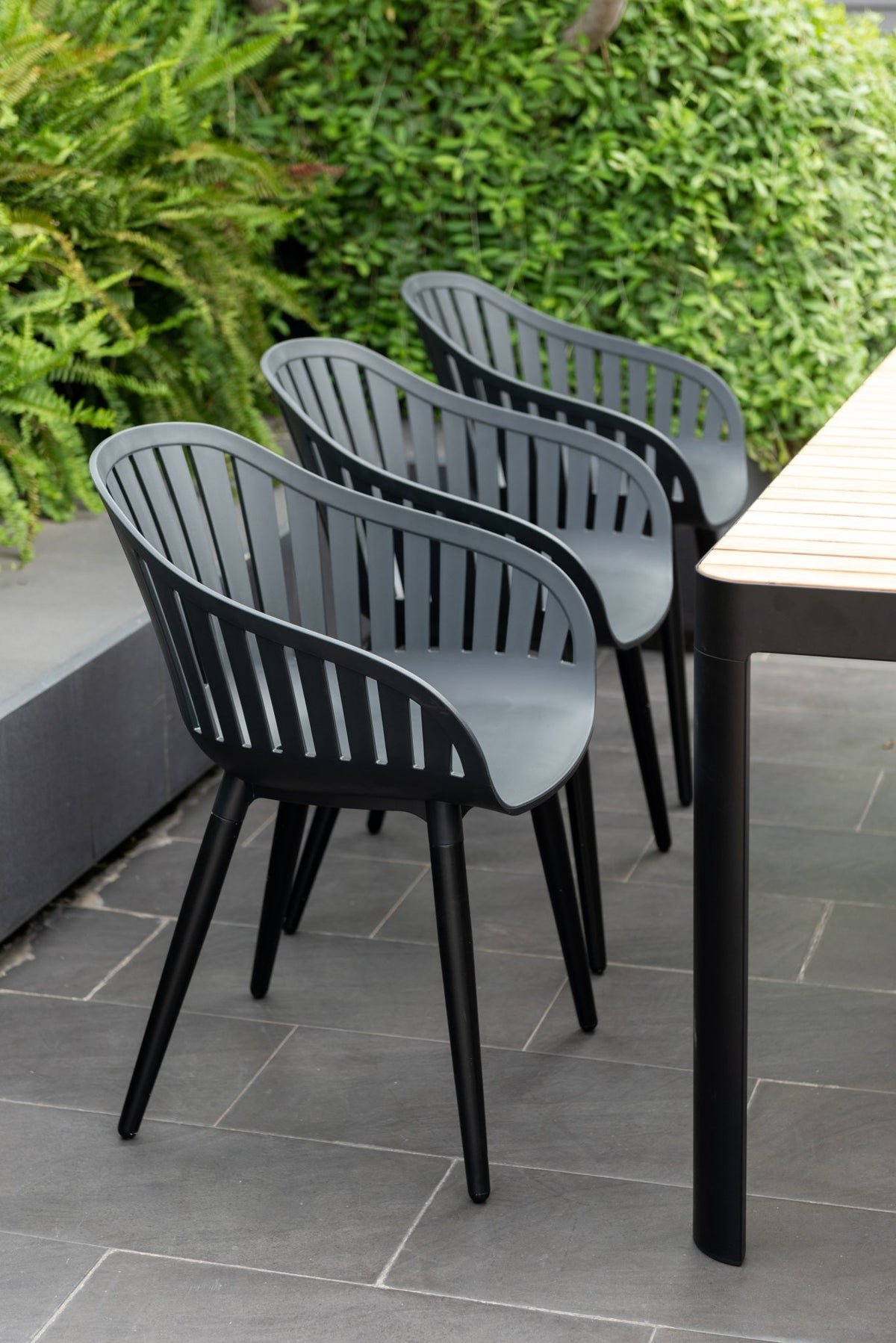 Portals Dark Rectangular Teak Table and 6 Nassau Black Aluminum Dining Set - Home Outpost Supply