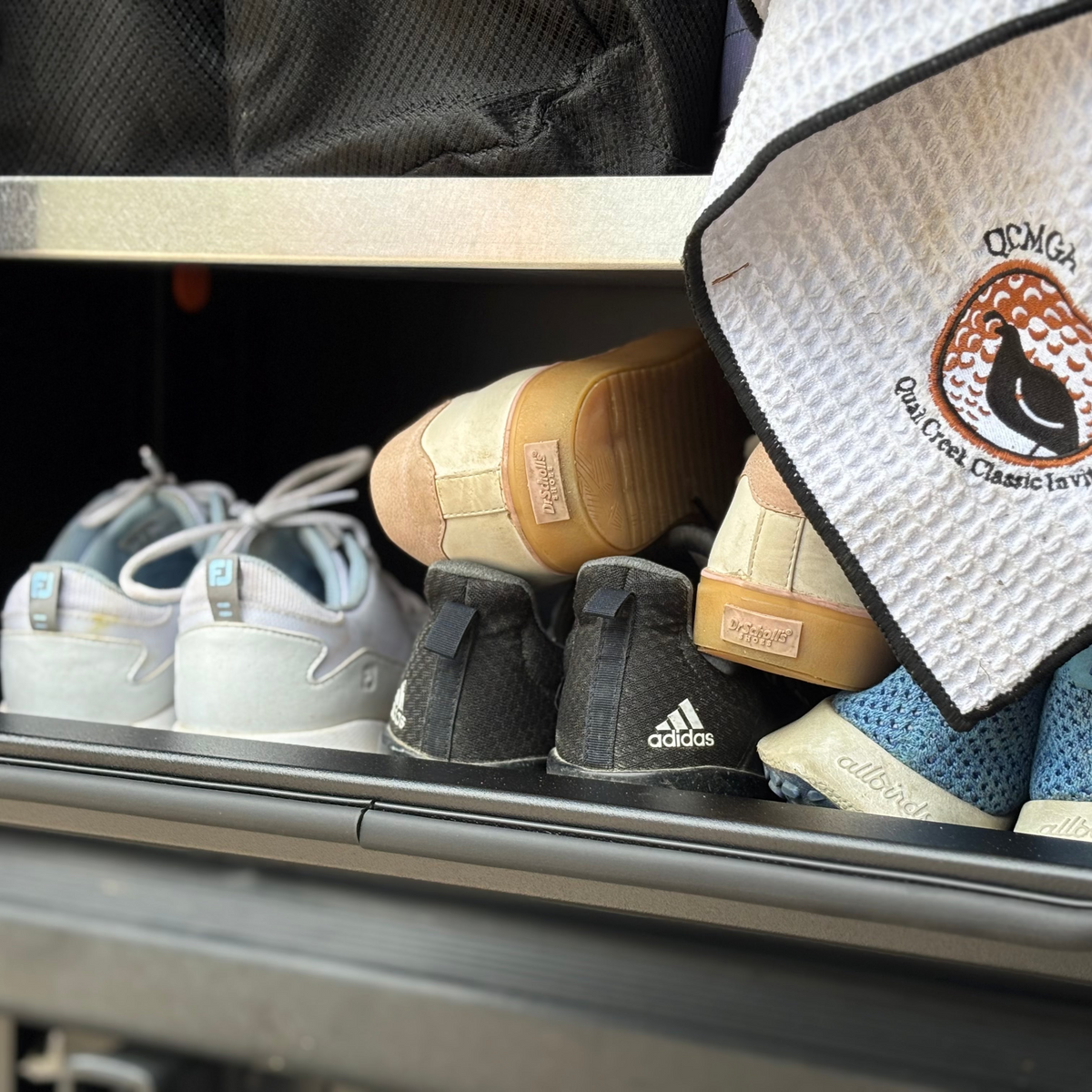 Avatar Offroad Caddie Golf Storage Box with shoes and accessories inside vehicle